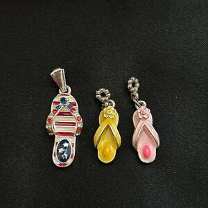 Three Sandler pendants